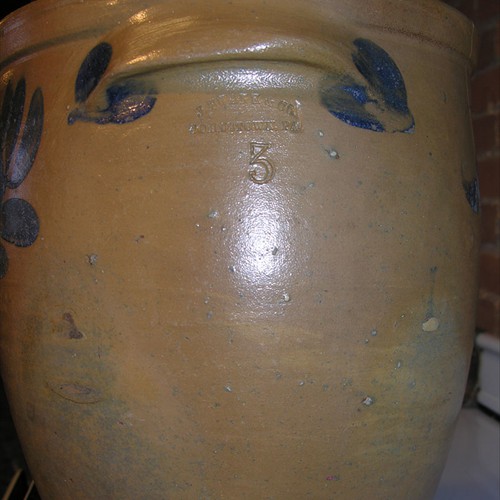 As pottery production became more mechanized, stamped size indicators replaced hand painted ones, as on this 3 gallon crock by Swank. The 3 is visible below the small handle indentation. Collection of the Johnstown Area Heritage Association, Johnstown, PA. Visit them at www.jaha.org.