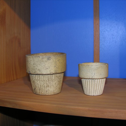 Early stoneware pieces were individually handmade. Later, ribbed ware such as these small flower pots was produced using molds. Collection of the Johnstown Area Heritage Association, Johnstown, PA.  Visit them at www.jaha.org.