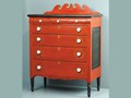 All the hallmarks of Soap Hollow furniture are evident in this 1867 chest of drawers, such as the scrolled backboard, drop centered skirt, bright red color, and stenciled decoration.<br/>Jeremiah Stahl (1830-1907). Soap Hollow Seven Drawer Chest, 1867, cherry and tulip poplar wood (painted and stenciled), 54 1/4 x 40 1/2 x 19 3/4 inches. Collection of the Westmoreland Museum of American Art, Greensburg, PA. Gift of the Westmoreland Society. 2002. 2003.3.   Visit them at www.thewestmoreland.org.